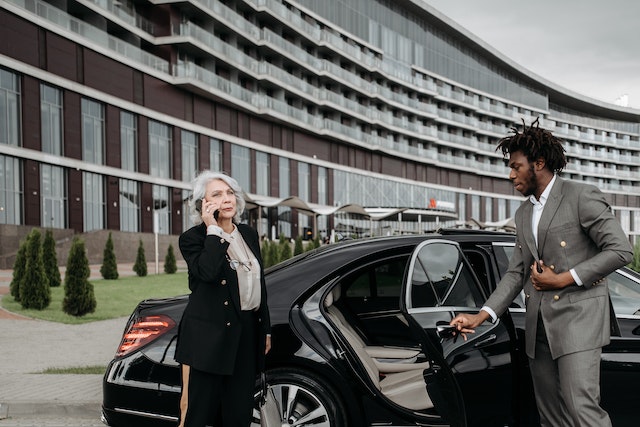 chauffeur opening doors